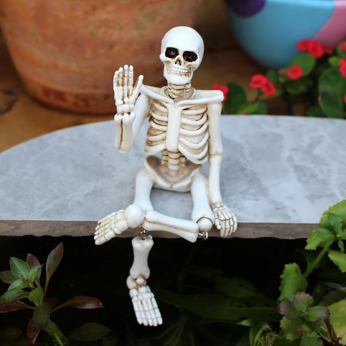 Halloween decorations, waving hands, skull ornaments, resin crafts, ghost festival horror atmosphere, landscaping props